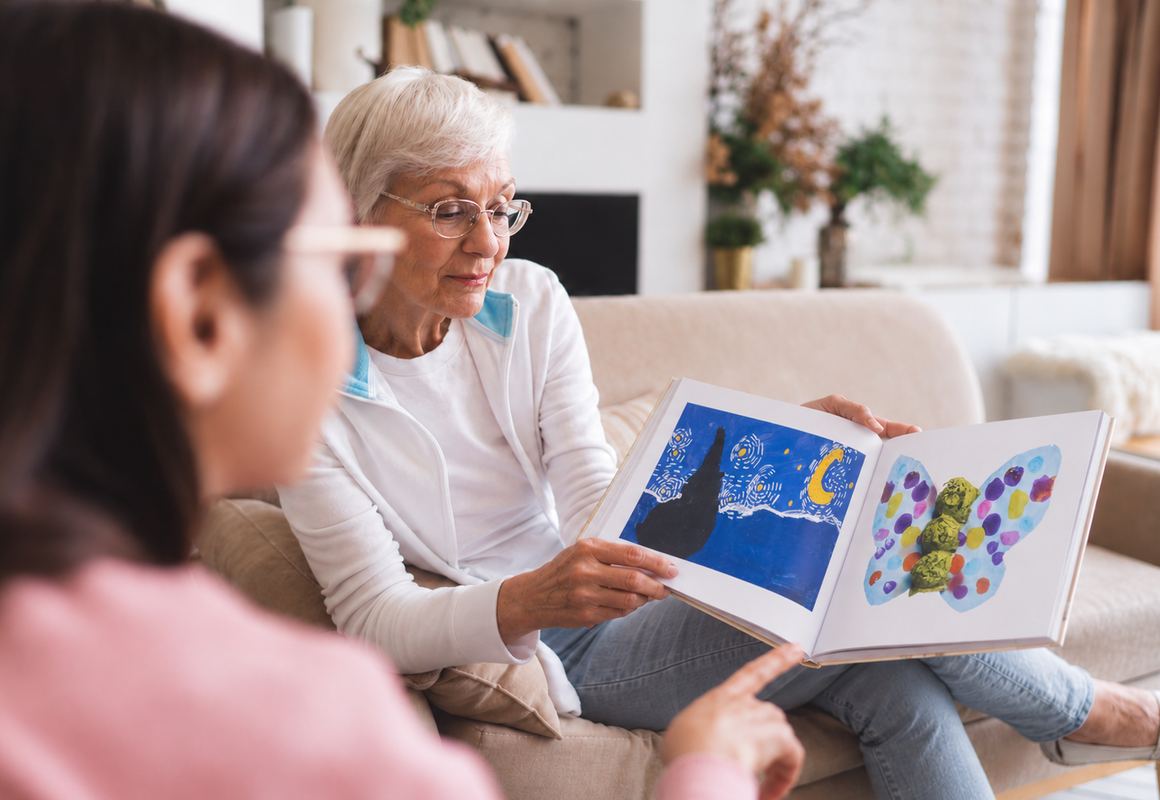 Grandparents reading a Kids Art Book together