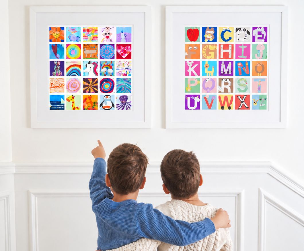 Two kids looking up at two framed mosaics of their artwork